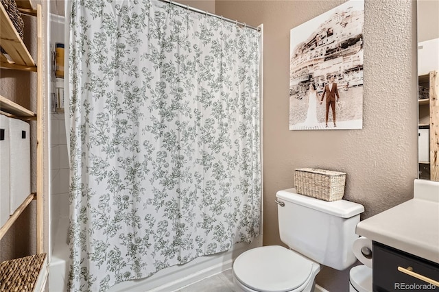 full bathroom with vanity, shower / bath combination with curtain, and toilet