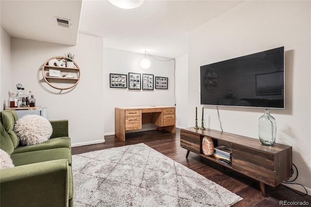 living room with dark wood-type flooring