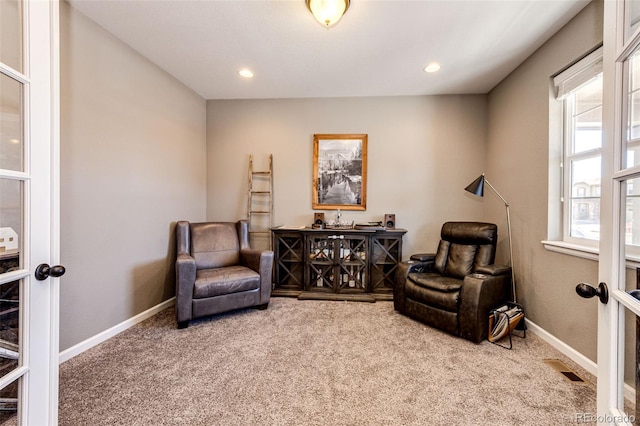 sitting room with recessed lighting, carpet flooring, visible vents, baseboards, and french doors