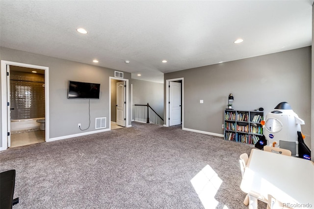 interior space featuring baseboards, carpet flooring, visible vents, and recessed lighting