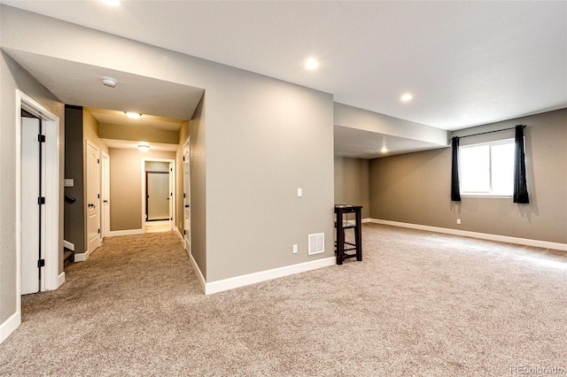 interior space with baseboards, visible vents, and recessed lighting