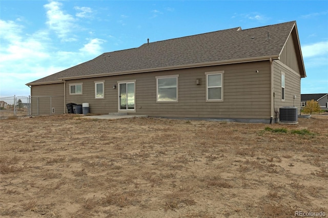 back of property featuring cooling unit