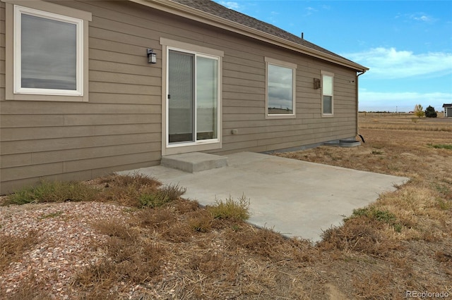 rear view of property with a patio area