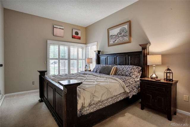 5555 E Briarwood Ave Unit 603, Centennial, CO 80122 - bedroom featuring light colored carpet and a textured ceiling