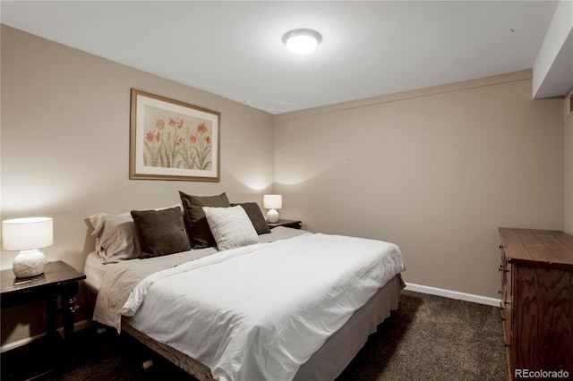 5555 E Briarwood Ave Unit 603, Centennial, CO 80122 - bedroom featuring dark colored carpet and baseboards