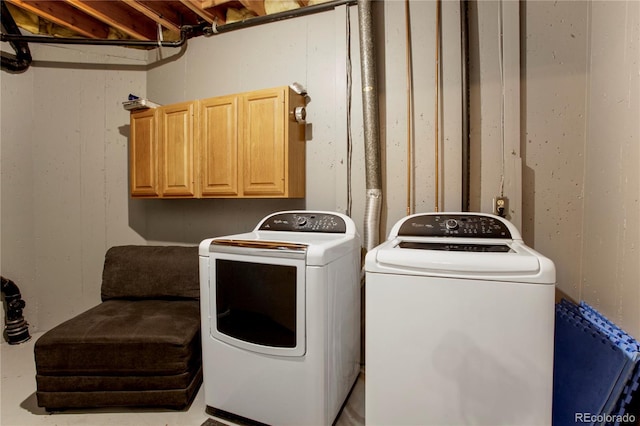 5555 E Briarwood Ave Unit 603, Centennial, CO 80122 - laundry room with cabinet space and washer and clothes dryer
