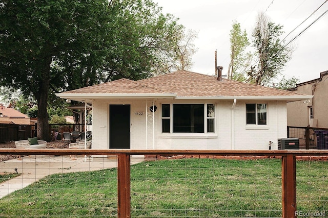 4422 W 27th Ave, Denver, CO 80212 - view of front facade with central AC and a shingled roof