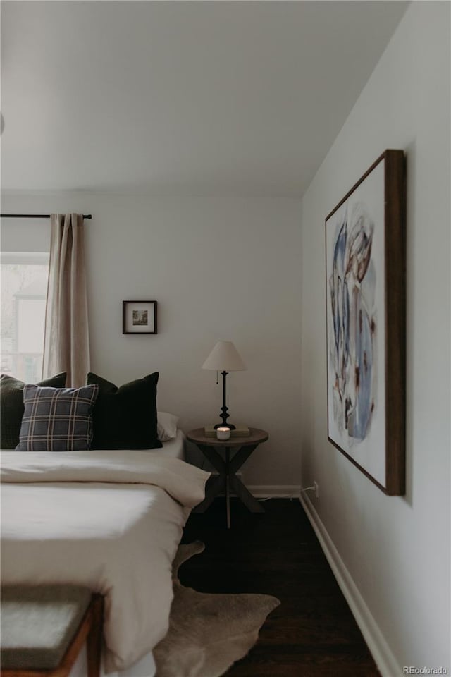 4422 W 27th Ave, Denver, CO 80212 - bedroom featuring baseboards and wood finished floors