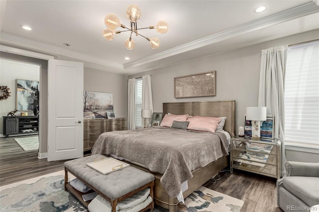 5964 E 141st Ave, Thornton, CO 80602 - bedroom featuring wood finished floors, ornamental molding, a chandelier, and recessed lighting