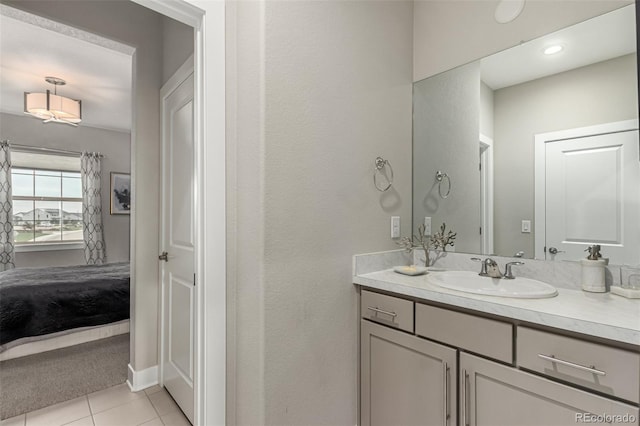 5964 E 141st Ave, Thornton, CO 80602 - ensuite bathroom featuring vanity and tile patterned floors