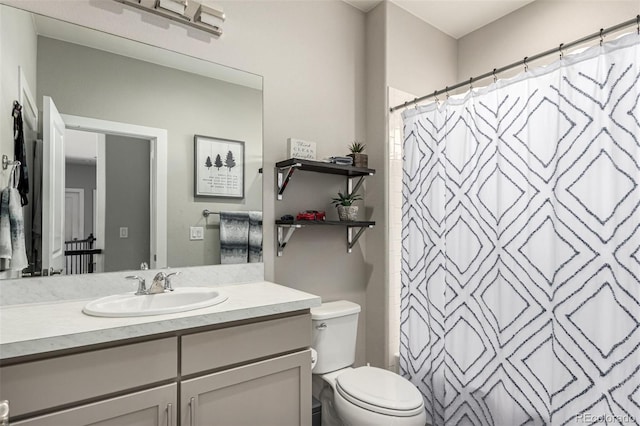 5964 E 141st Ave, Thornton, CO 80602 - bathroom featuring toilet, vanity, and curtained shower