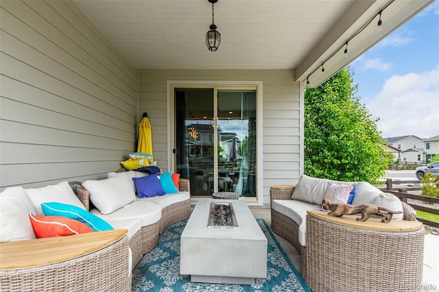 5964 E 141st Ave, Thornton, CO 80602 - view of patio with an outdoor living space with a fire pit