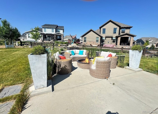 5964 E 141st Ave, Thornton, CO 80602 - view of patio / terrace featuring an outdoor fire pit and a residential view