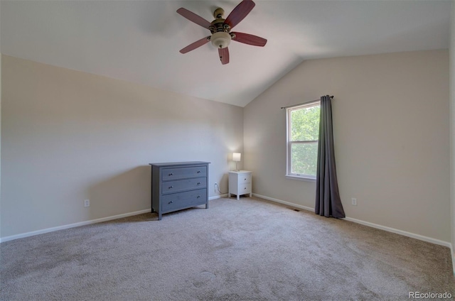 12535 S Beaver Creek Way, Parker, CO 80134 - spare room featuring lofted ceiling, a ceiling fan, and carpet floors
