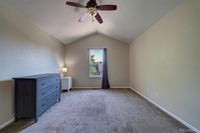 12535 S Beaver Creek Way, Parker, CO 80134 - unfurnished bedroom featuring light colored carpet, lofted ceiling, and a ceiling fan
