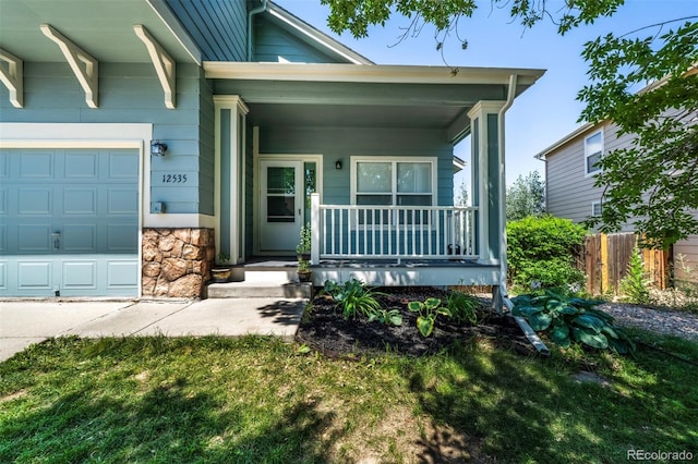 12535 S Beaver Creek Way, Parker, CO 80134 - view of front facade with covered porch and stone siding