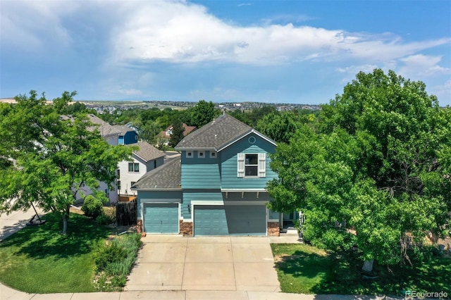 12535 S Beaver Creek Way, Parker, CO 80134 - view of front of property with driveway, an attached garage, and roof with shingles