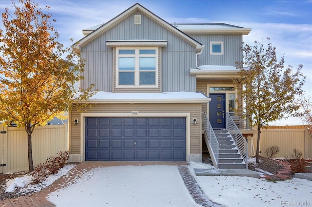 17938 E 54th Ave, Denver, CO 80249 - traditional-style home featuring board and batten siding, driveway, fence, and a garage