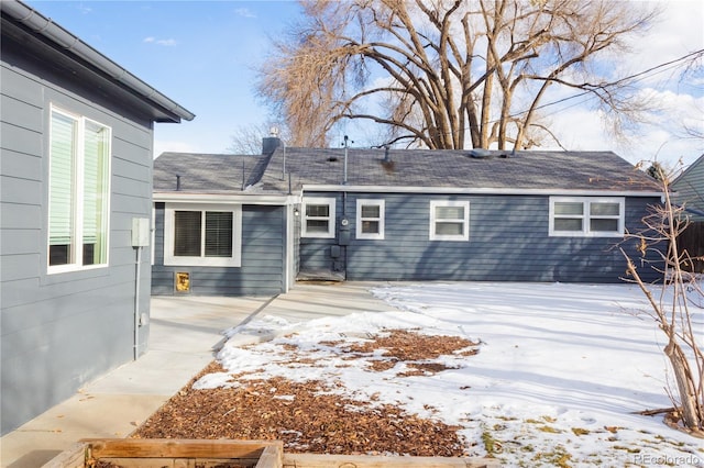 view of snow covered property