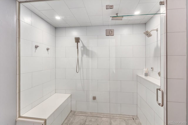 bathroom featuring a shower stall