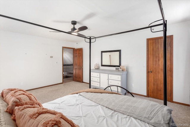 bedroom featuring baseboards, carpet, and a ceiling fan