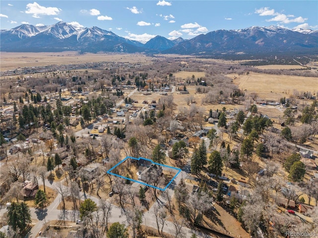 drone / aerial view featuring a mountain view