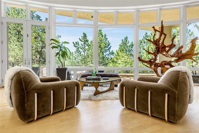 1250 Dolan Dr, Monument, CO 80132 - sunroom featuring french doors and wood finished floors
