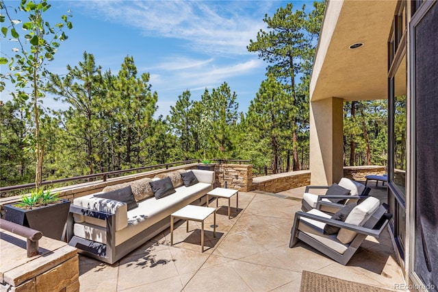 1250 Dolan Dr, Monument, CO 80132 - view of patio featuring an outdoor living space