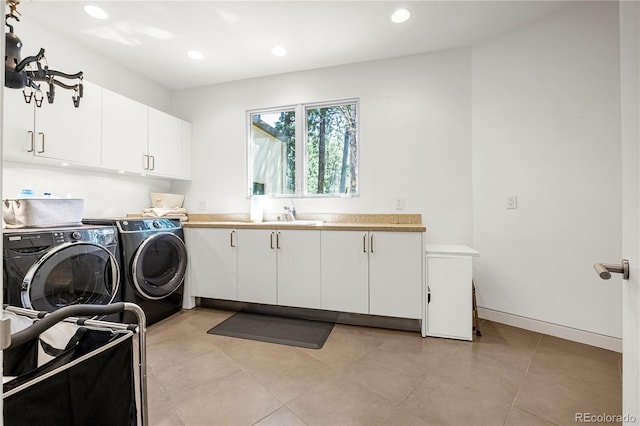 1250 Dolan Dr, Monument, CO 80132 - washroom with cabinet space, washer and clothes dryer, recessed lighting, and light tile patterned floors
