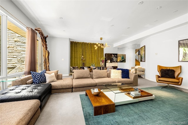 1250 Dolan Dr, Monument, CO 80132 - carpeted living area with a chandelier and healthy amount of natural light