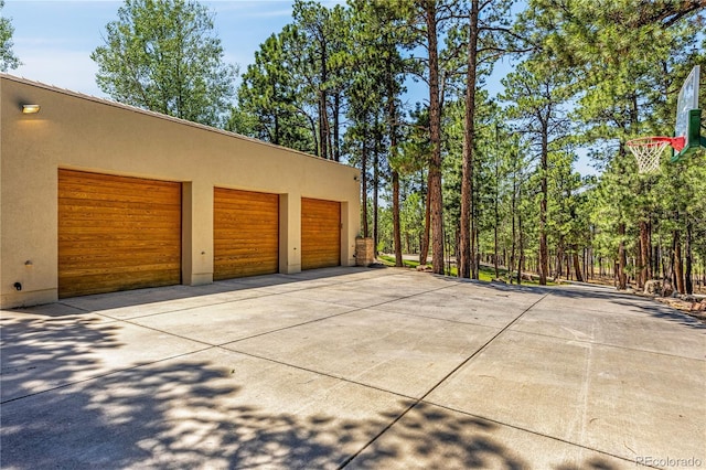 1250 Dolan Dr, Monument, CO 80132 - garage with concrete driveway
