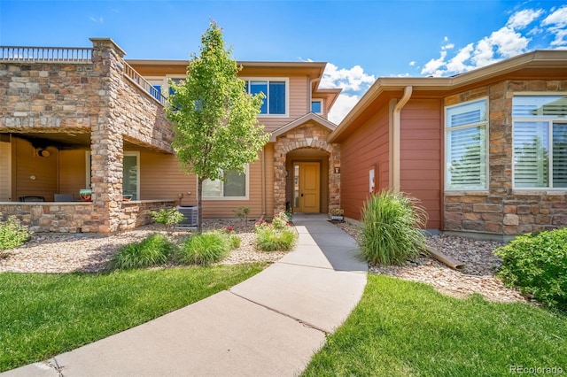 8626 Gold Peak Dr Unit B, Highlands Ranch, CO 80130 - entrance to property with stone siding
