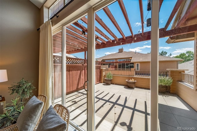 8626 Gold Peak Dr Unit B, Highlands Ranch, CO 80130 - view of patio featuring a pergola