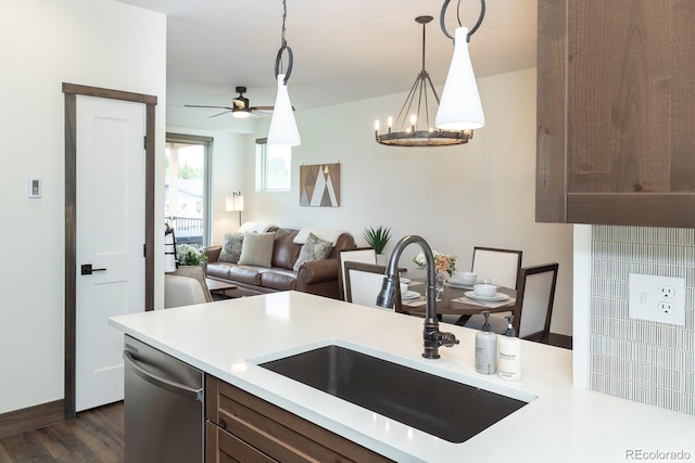 361 Gcr 840 Unit 3, Fraser, CO 80442 - kitchen with light countertops, a ceiling fan, stainless steel dishwasher, dark wood-style floors, and hanging light fixtures