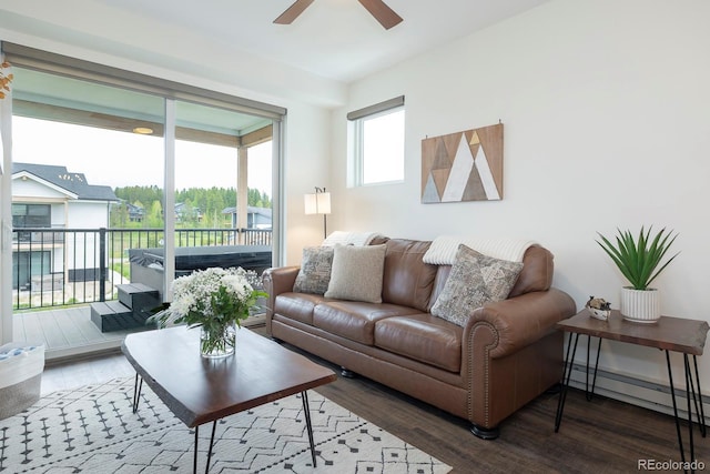 361 Gcr 840 Unit 3, Fraser, CO 80442 - living room with a ceiling fan, wood finished floors, and baseboard heating