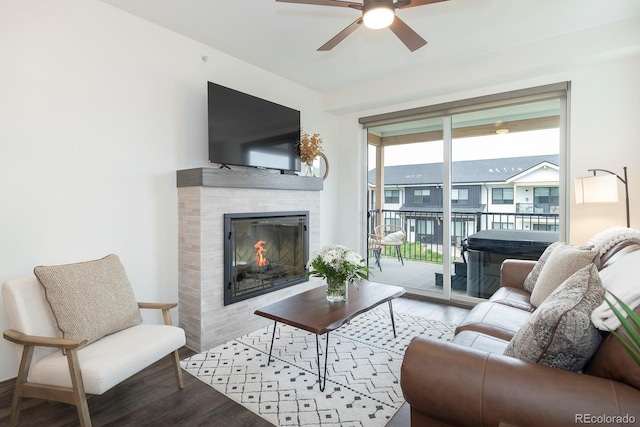 361 Gcr 840 Unit 3, Fraser, CO 80442 - living area with wood finished floors, ceiling fan, and a tiled fireplace