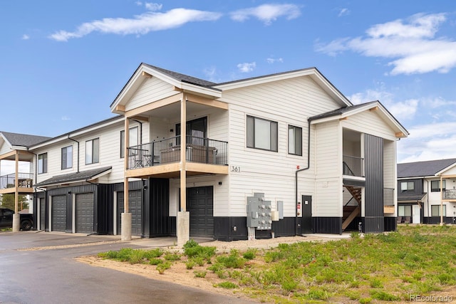 361 Gcr 840 Unit 3, Fraser, CO 80442 - view of front of property featuring a garage, a balcony, and driveway