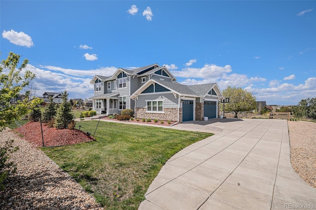 7692 Weaver Cir, Castle Rock, CO 80104 - view of front facade featuring a garage, stone siding, a front lawn, and driveway