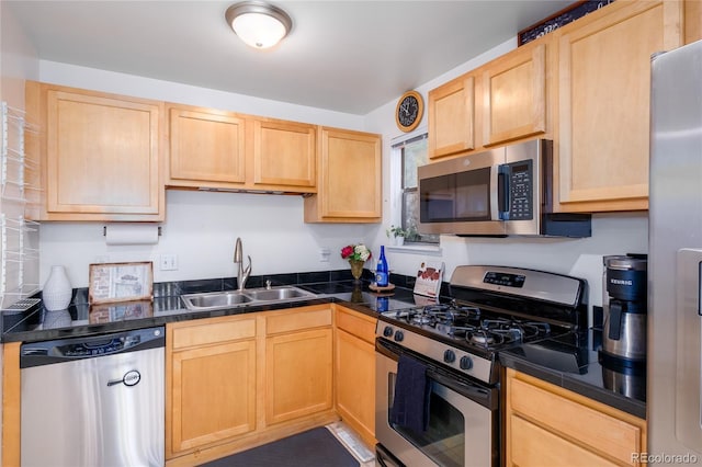 9675 E Kansas Cir Unit 48, Denver, CO 80247 - kitchen with appliances with stainless steel finishes and light brown cabinets