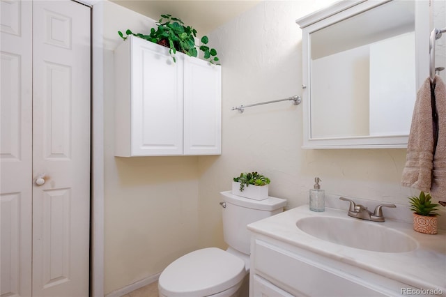 9675 E Kansas Cir Unit 48, Denver, CO 80247 - half bathroom featuring vanity and a closet