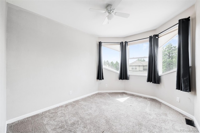 7038 Russell Ct, Arvada, CO 80007 - spare room with carpet, baseboards, and ceiling fan