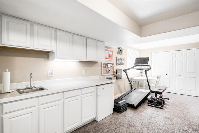 7038 Russell Ct, Arvada, CO 80007 - exercise room featuring a sink and carpet flooring