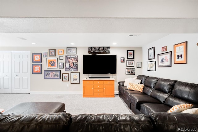 7038 Russell Ct, Arvada, CO 80007 - living area featuring light colored carpet, recessed lighting, and baseboards