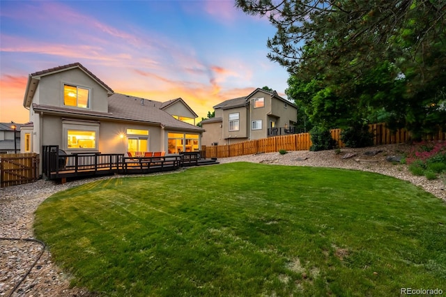 7038 Russell Ct, Arvada, CO 80007 - back of property at dusk with stucco siding