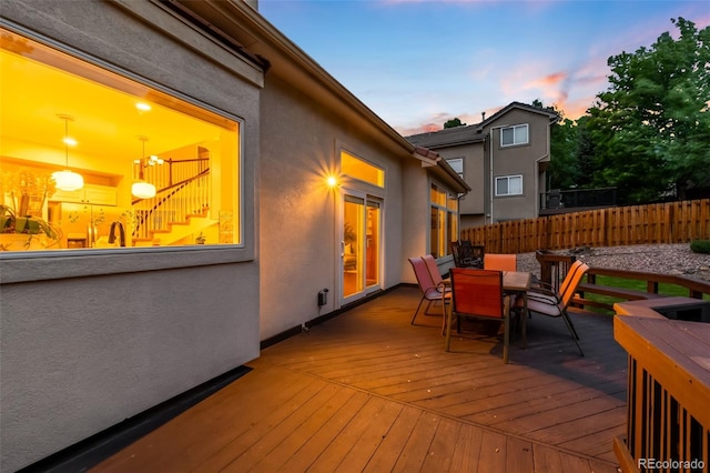 7038 Russell Ct, Arvada, CO 80007 - wooden terrace featuring outdoor dining space