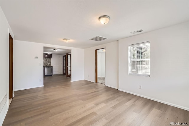 4730 S Huron St, Englewood, CO 80110 - spare room with wood finished floors and baseboards