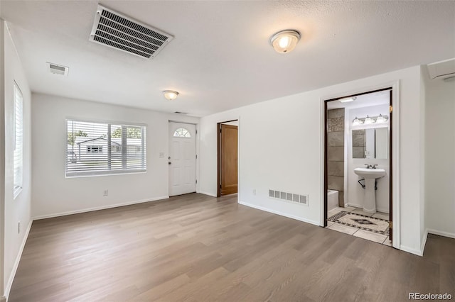 4730 S Huron St, Englewood, CO 80110 - foyer with wood finished floors and baseboards