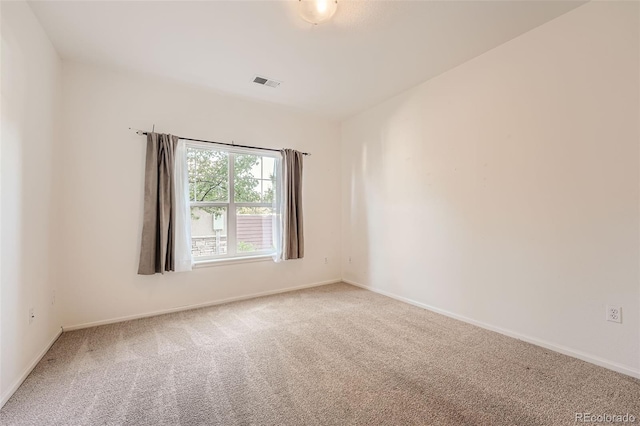 empty room with carpet floors