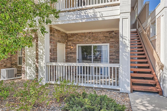 property entrance with central AC unit