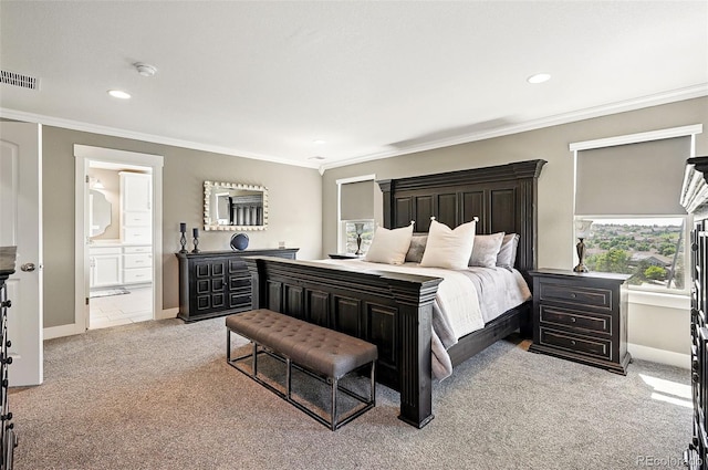 7949 S Elk Way, Aurora, CO 80016 - carpeted bedroom with ornamental molding, recessed lighting, and ensuite bath